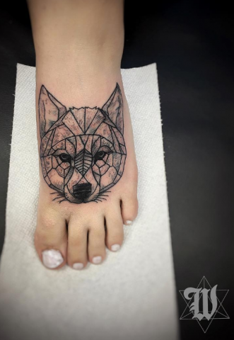 Phillip Wolves tattoo