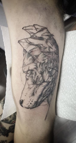 Phillip Wolves tattoo